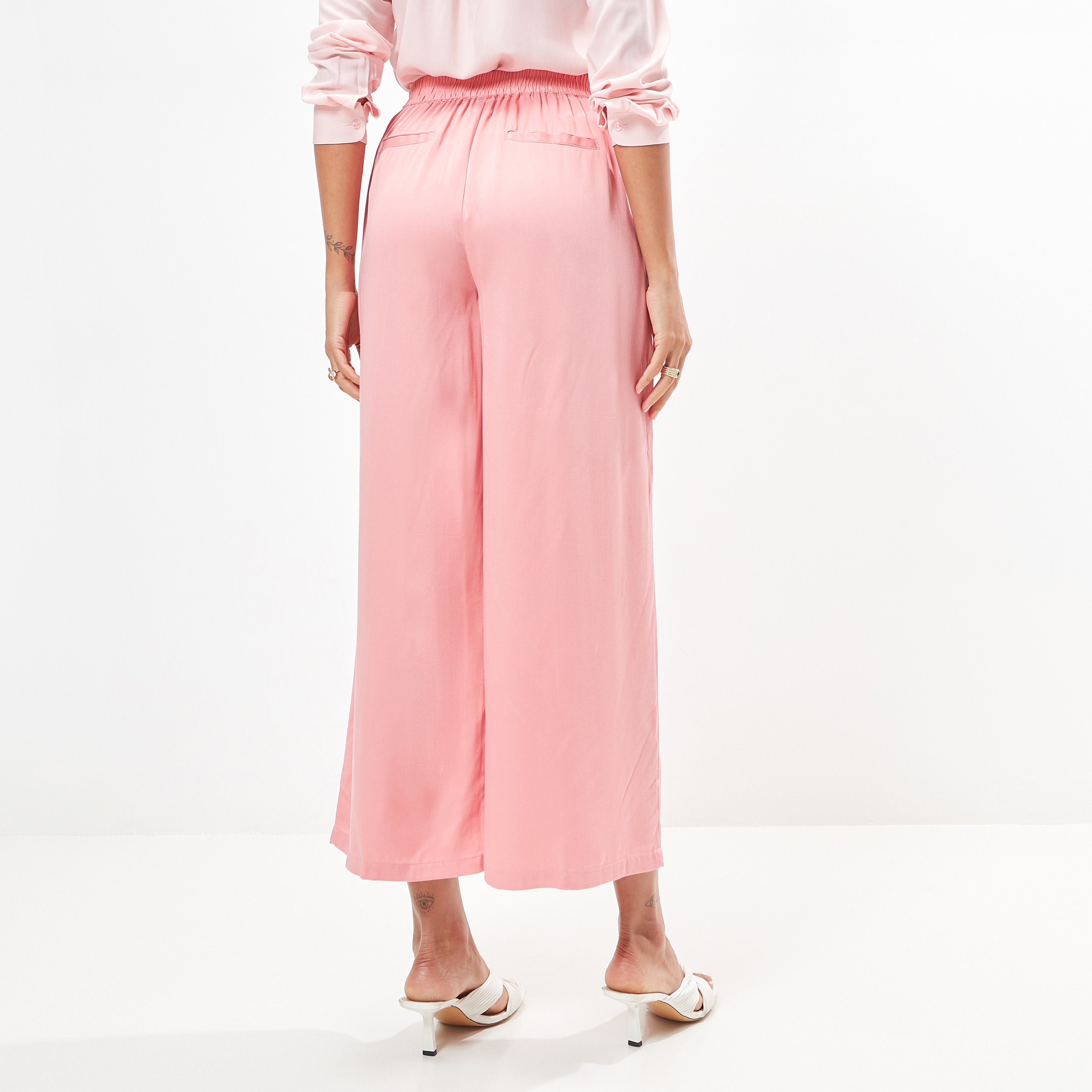 Buy Solid Mid-Rise Palazzo Pants with Tie-Up Detail and Pockets | Splash UAE